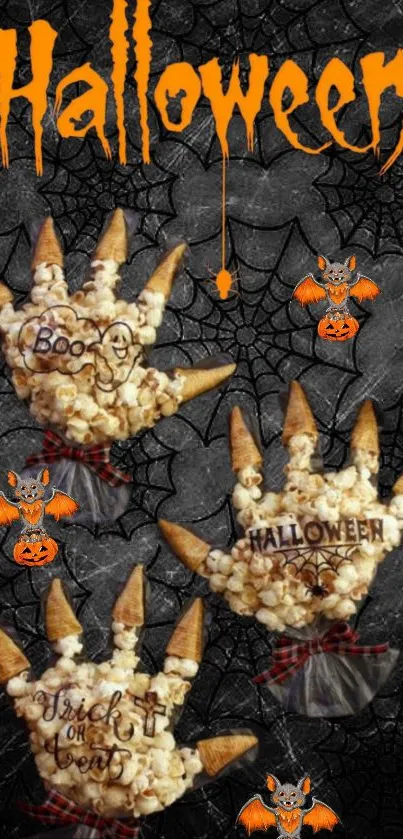 Spooky Halloween popcorn hands on dark background with pumpkins and bats.