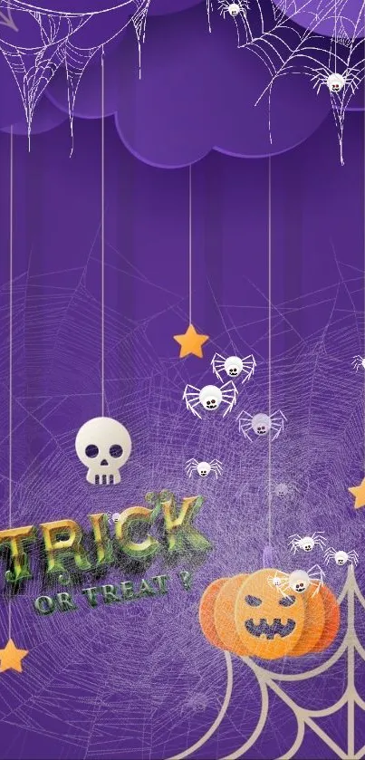 Spooky Halloween wallpaper with skulls and pumpkins on a purple background.