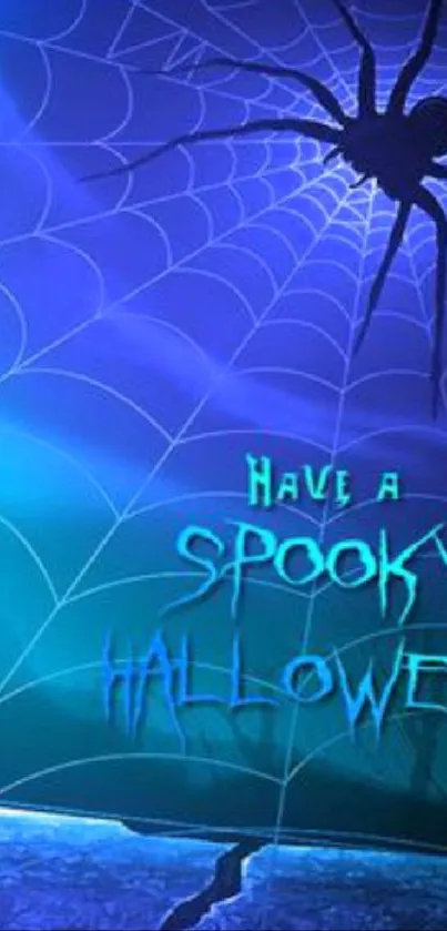 Spooky Halloween wallpaper with spider and web