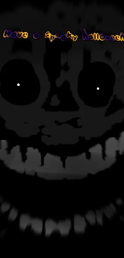 Spooky black Halloween face with glowing eyes on wallpaper.