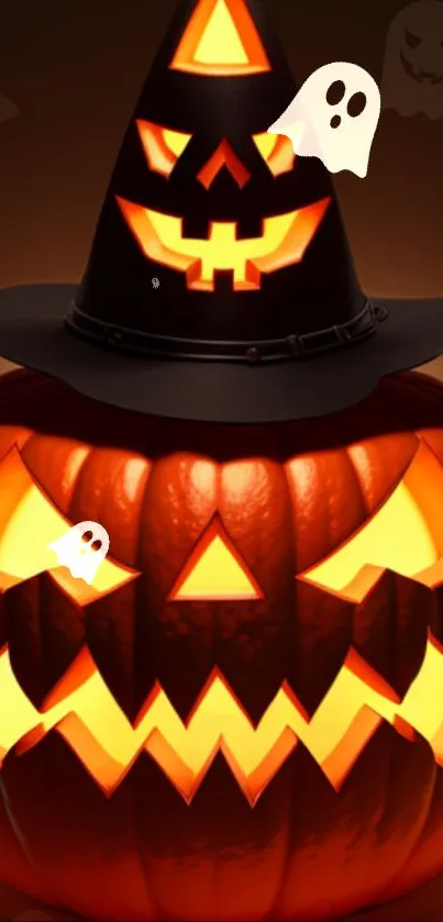 Halloween wallpaper featuring a glowing pumpkin with a witch hat and ghosts.