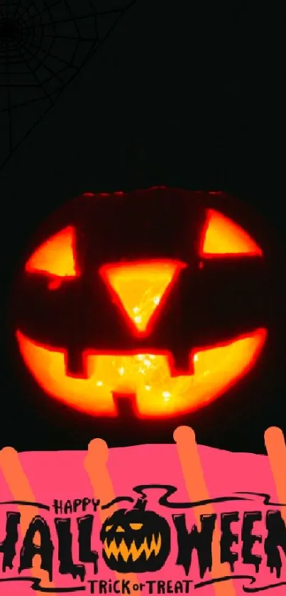 Glowing jack-o'-lantern with Halloween text on a dark background.