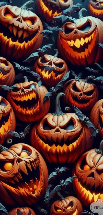 Spooky Halloween pumpkin wallpaper with glowing orange faces.