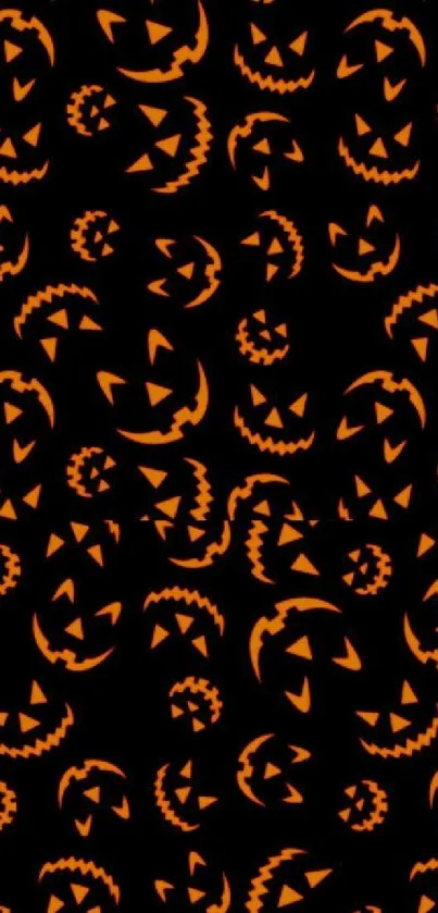 Halloween mobile wallpaper with spooky pumpkin faces on a black background.