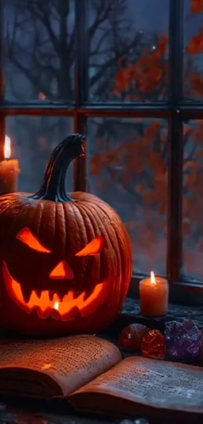 Carved pumpkin with glowing candles by window on Halloween night.