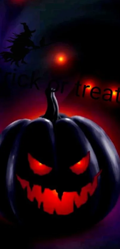 Spooky Halloween pumpkin wallpaper with glowing eyes and colorful background.