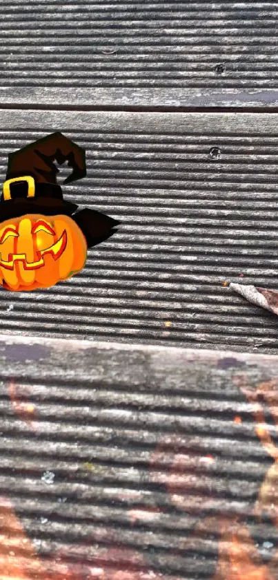 Halloween pumpkin with witch hat on wooden background wallpaper.