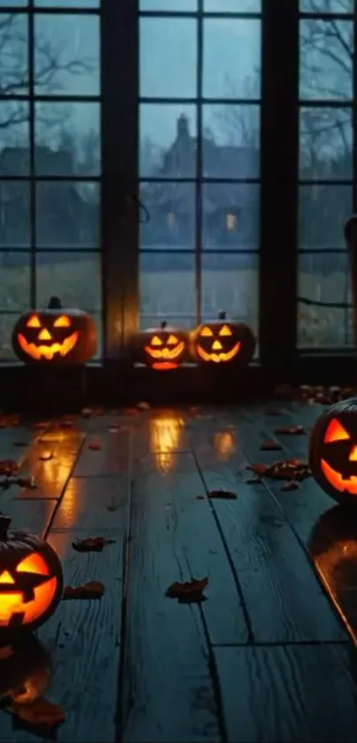 Spooky Halloween jack-o'-lanterns on a rainy night.