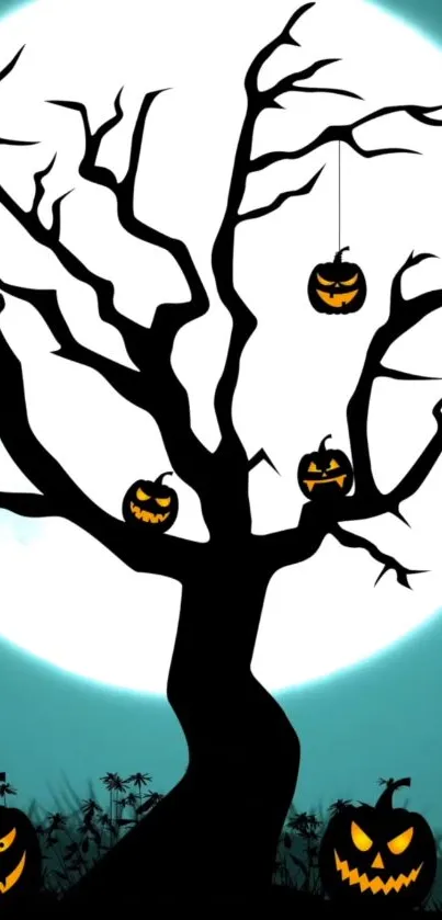 Spooky silhouetted tree with jack-o'-lanterns under a full moonlight.