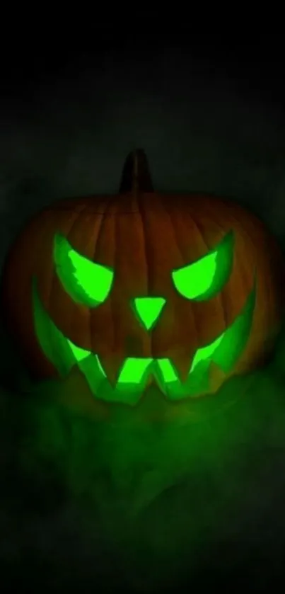 Spooky glowing Jack-O'-Lantern with eerie fog background.