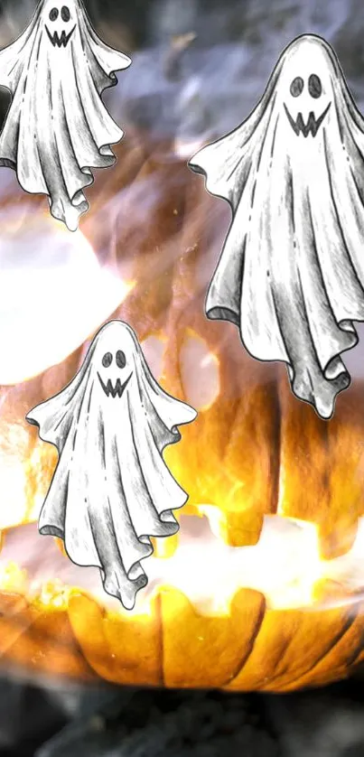 Mobile wallpaper featuring ghosts over a glowing pumpkin.