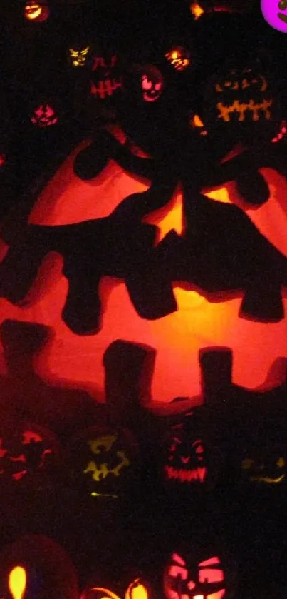 Halloween wallpaper featuring glowing jack-o'-lantern pumpkins.