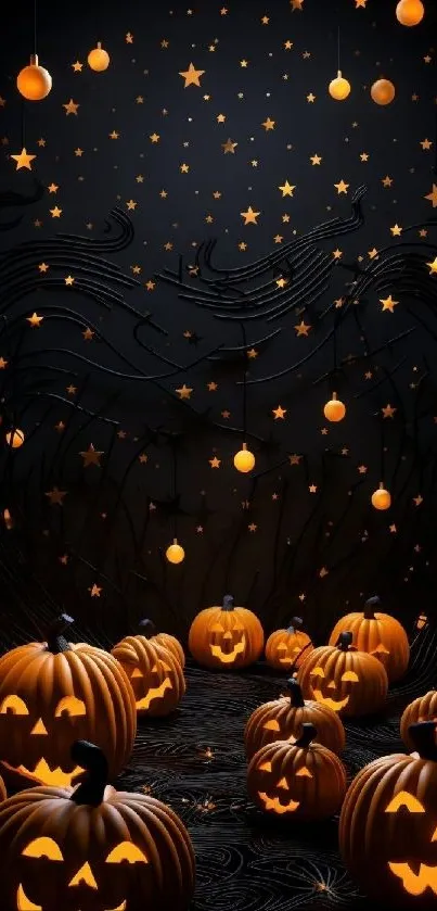 Spooky Halloween wallpaper with glowing pumpkins on a starry night backdrop.