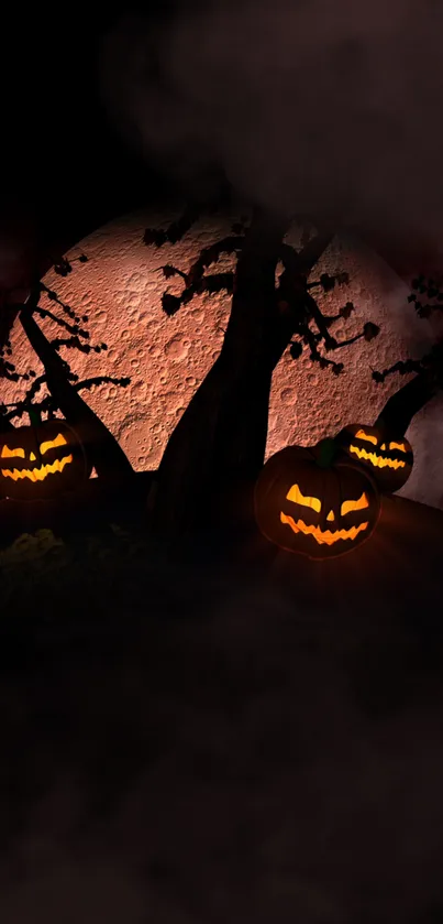 Glowing pumpkins with eerie moon backdrop for Halloween wallpaper.