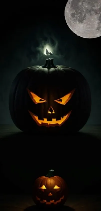 Moonlit Halloween wallpaper with glowing pumpkins.