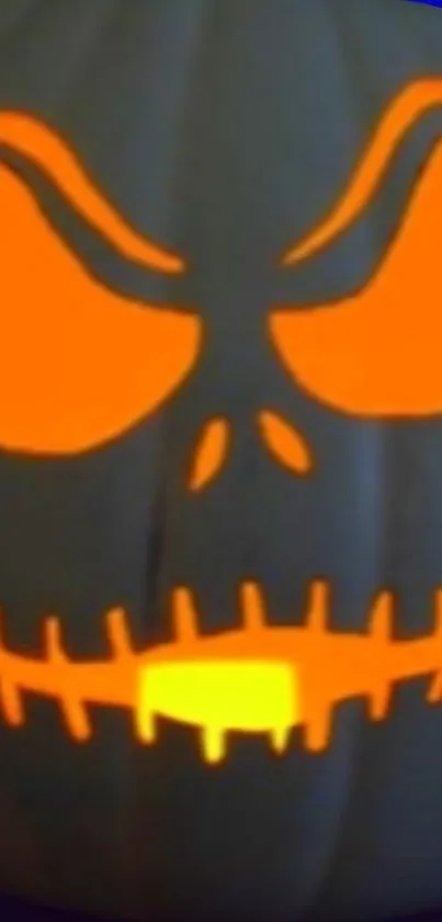 Glowing orange-faced pumpkin with spooky expression.