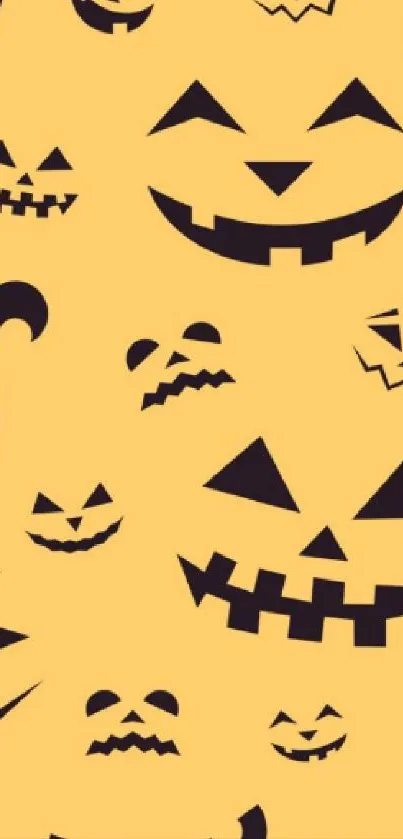 Colorful Halloween pumpkin wallpapers on a phone screen.