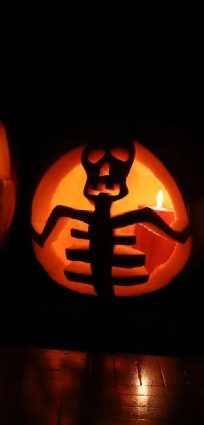 Glowing skeleton pumpkin carving in the dark.