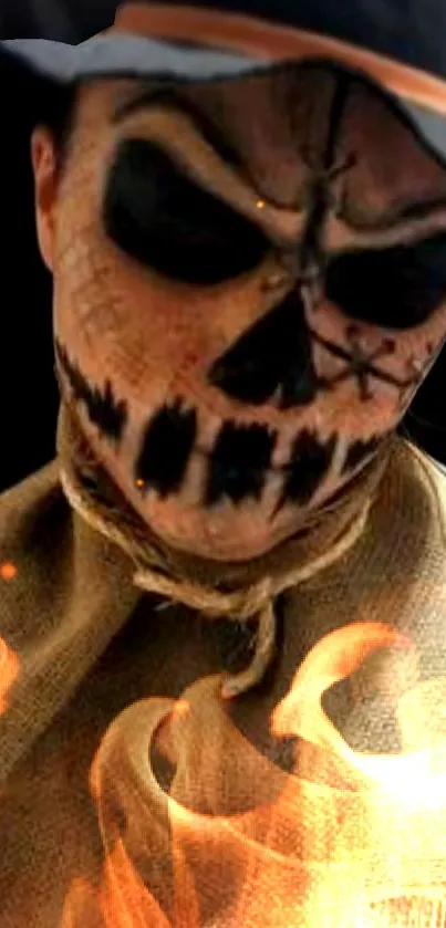 Spooky skull face with fire elements on a dark background wallpaper.