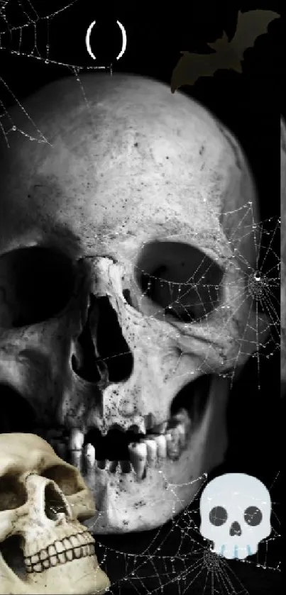 Spooky wallpaper with skulls, bats, and spider webs on a dark background.