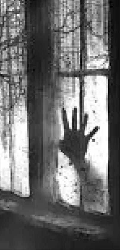 Black-and-white wallpaper with a ghostly hand on a window.