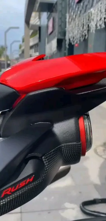 Sport motorcycle tailpiece with red accent.