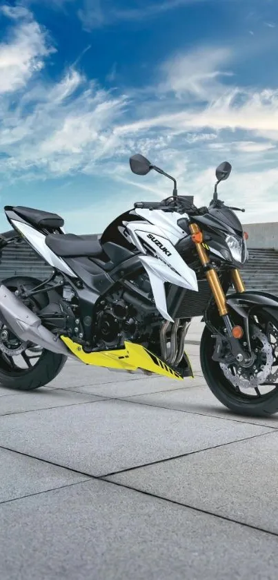 Sleek sport motorcycle with clear blue sky.