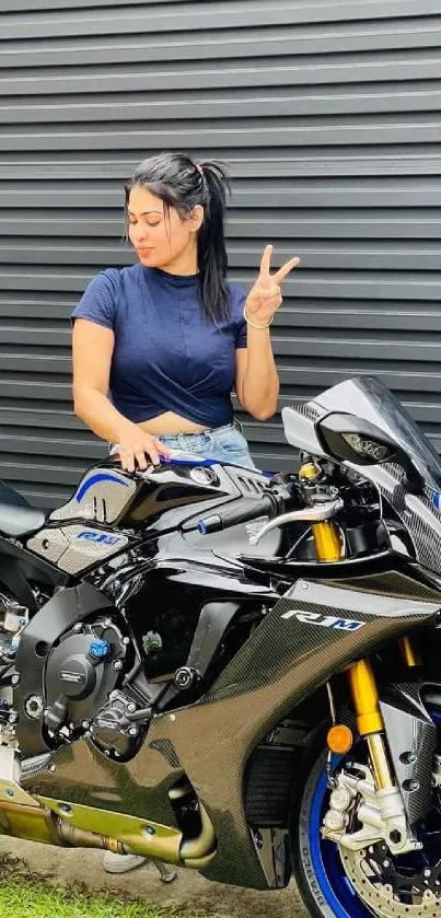 Sportbike and rider in front of garage door.