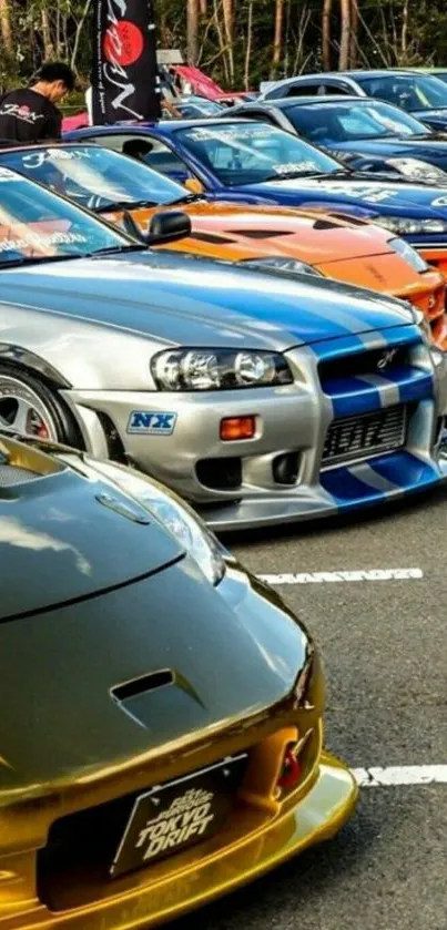 Row of vibrant sports cars parked outdoors.