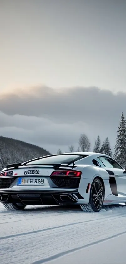 Sportscar driving through snowy winter landscape, surrounded by trees.