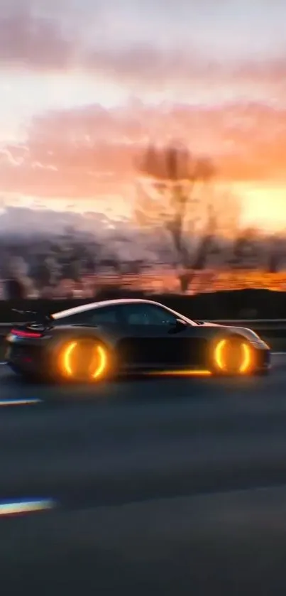 Sportscar speeds through a vibrant sunset with glowing wheels.