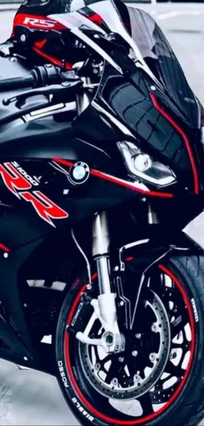 Sporty black and red motorcycle, sleek and dynamic design.