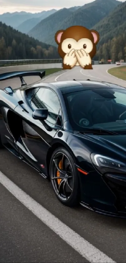 Sleek black sports car with humorous emoji on a scenic roadway.