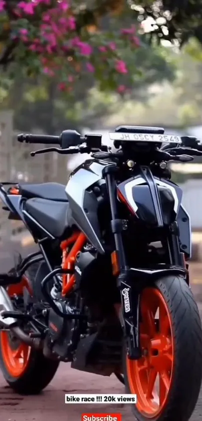 High-performance motorcycle with vibrant orange accents parked in sunlight.