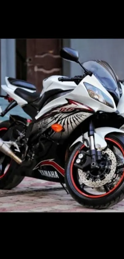 Sleek and sporty black and white motorcycle on display.