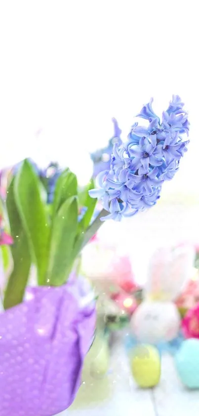 Lilac flower with Easter decorations in soft pastel colors.