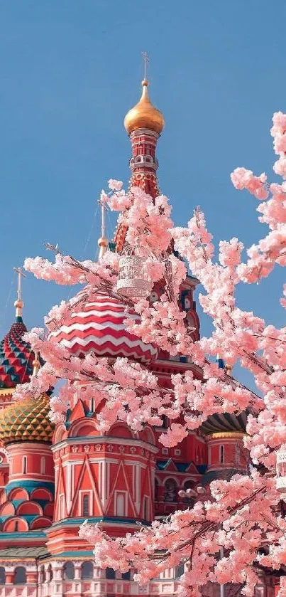 St. Basil's Cathedral with cherry blossoms under a blue sky.