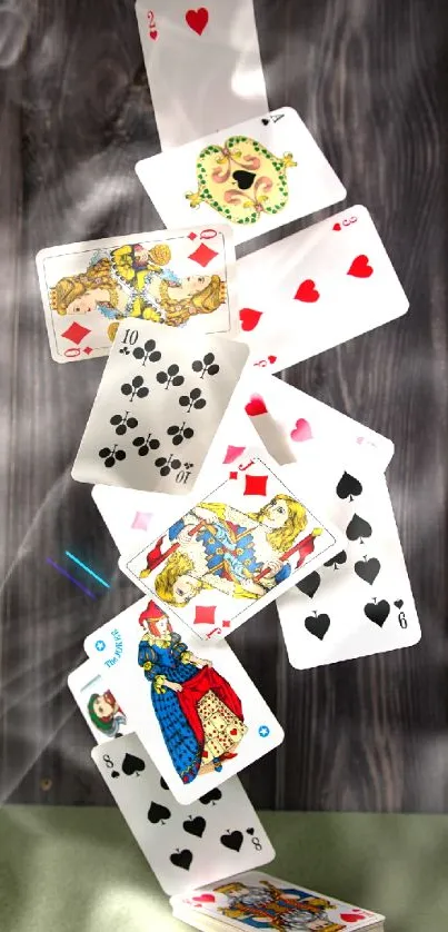 A creative stack of playing cards with dark wood background.