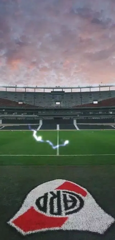 Stadium field at dusk with dramatic sky and team emblem.