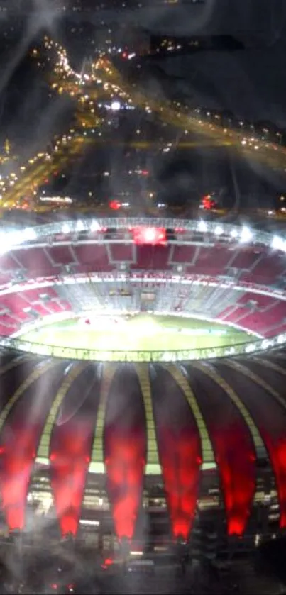 Aerial view of stadium lights glowing at night with cityscape beyond.