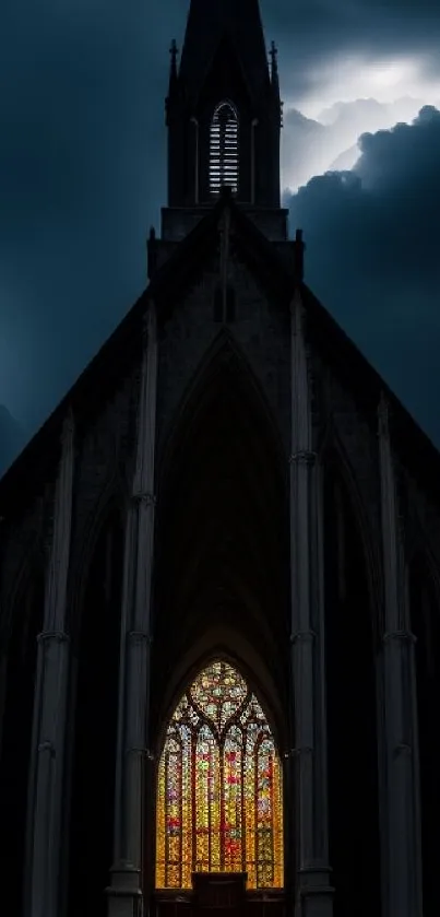 Gothic church with stained glass windows illuminated against dark clouds.