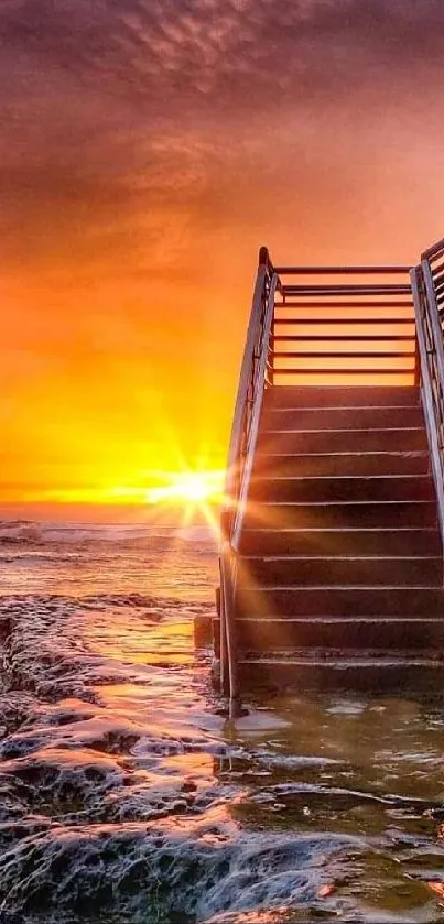 Vibrant sunset over ocean with stairs leading upward.