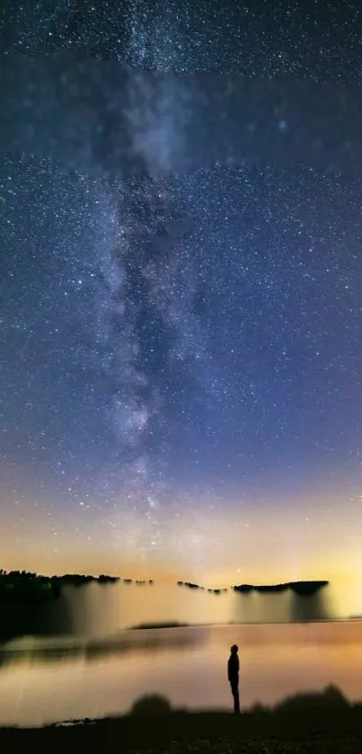 Stunning night sky with stars over a tranquil lake reflection.