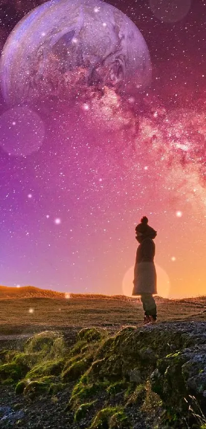 Person stands under cosmic sky with galaxy and planet rising.