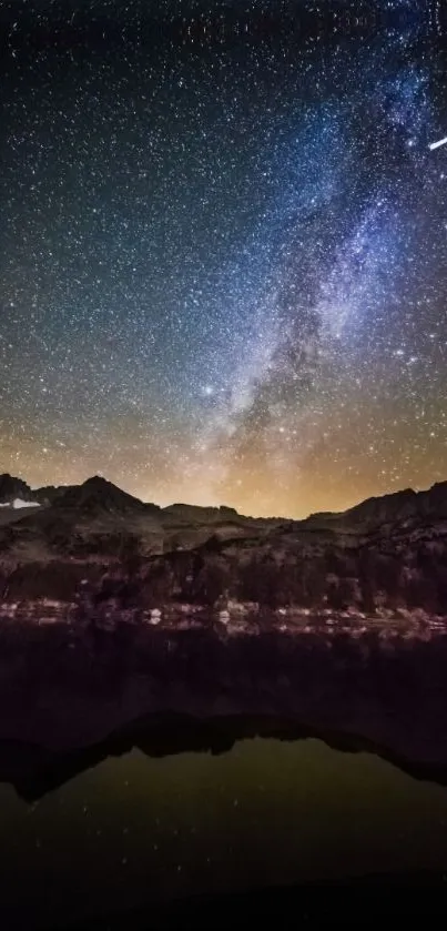 Starry night sky over mountains with shooting star.