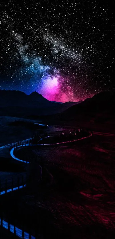 Vibrant starlit sky over winding mountain path.