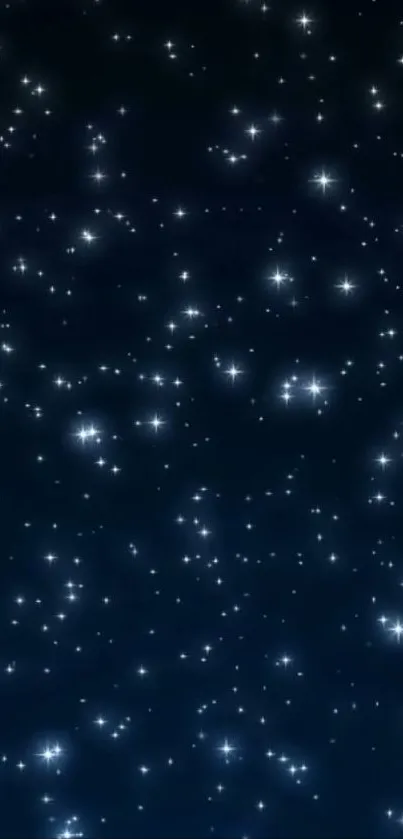 Star-filled night sky wallpaper with glowing sparkles on dark blue.