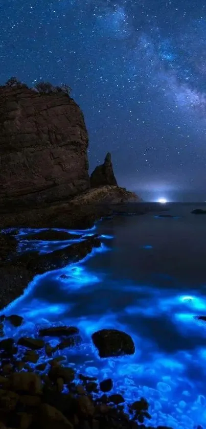 Bioluminescent waves under a starry night sky by the ocean.