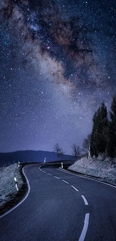 Stunning view of a star-filled night sky over a winding road.