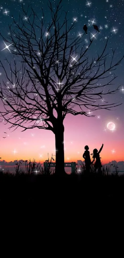 Silhouetted tree under starlit sky wallpaper